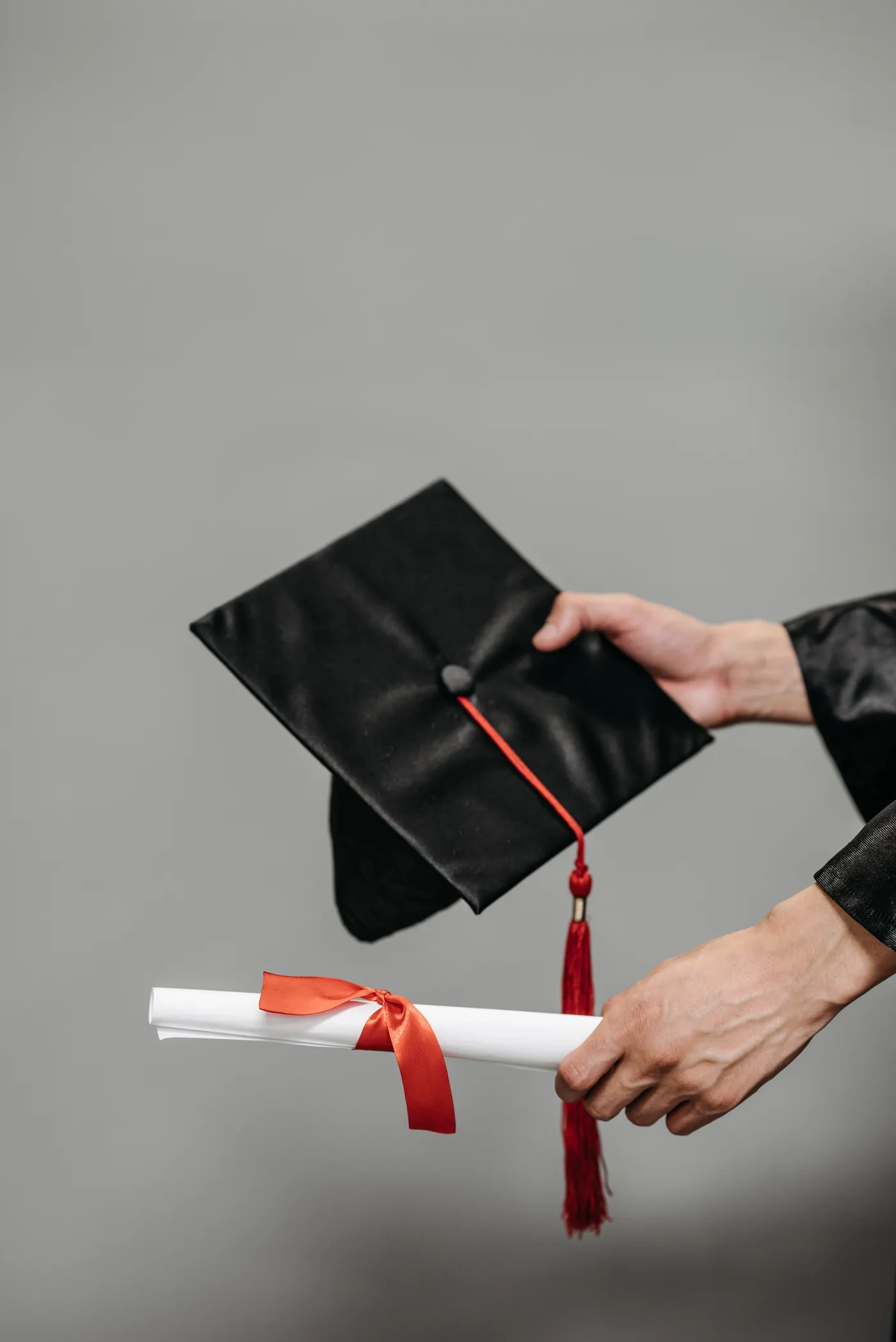 Graduation cap and diploma representing completion of an adult high school program